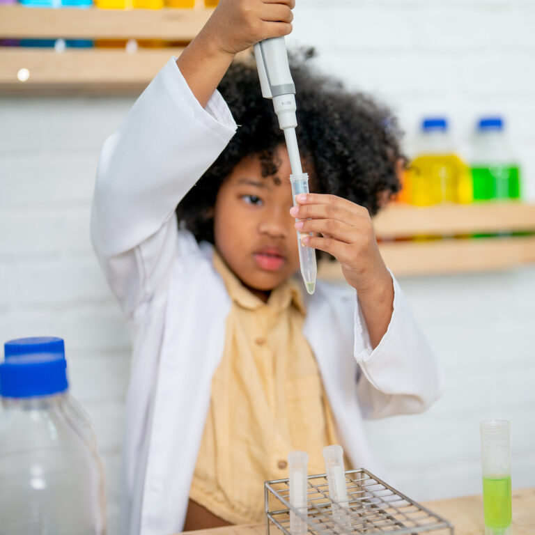 Girl doing science experiment